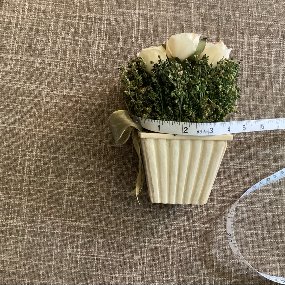 Small accessory to set on a shelf or desk.